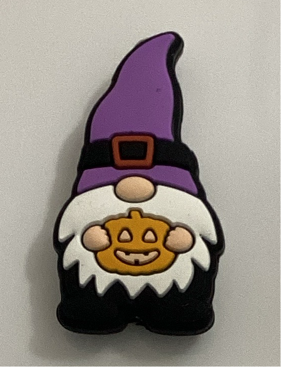 Gnome with Purple Hat Holding Jack-o’-lantern